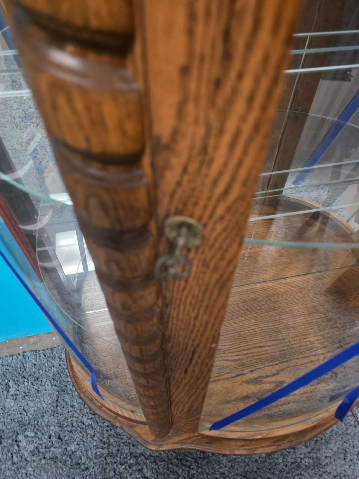 Vintage Curio Display Cabnit with Glass Panels and Wooden Fram